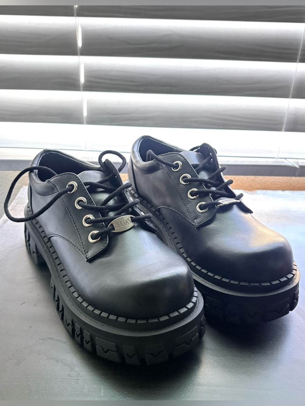 Delila’s Y2K Black Platform Oxfords
